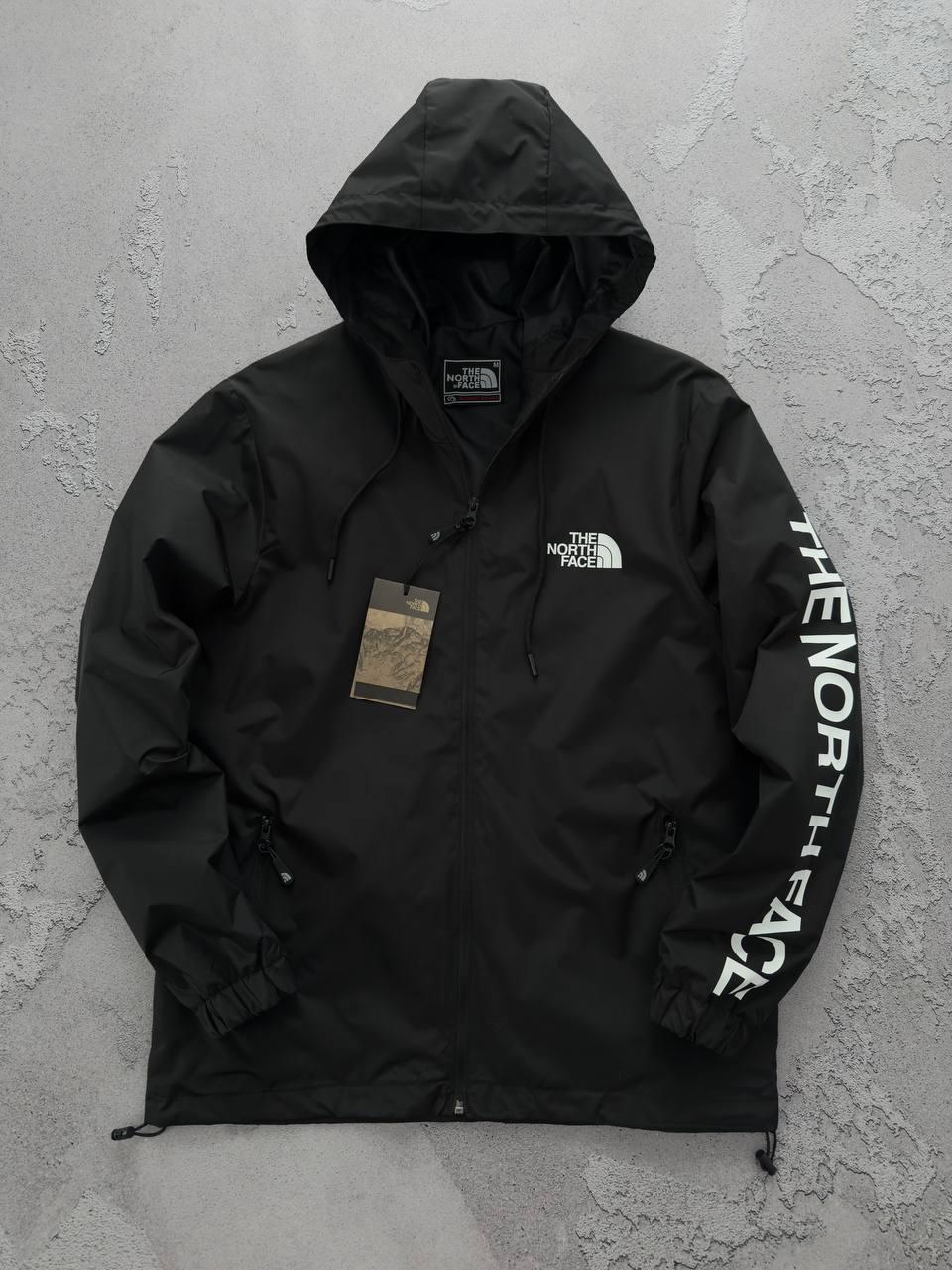 Чоловіча вітрівка The North Face з капюшоном чорна Куртка Зе Норд Фейс весняна
