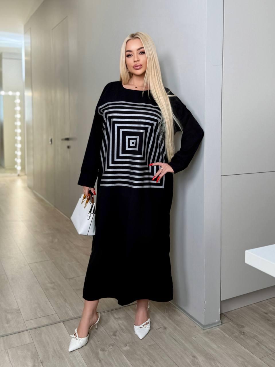 Сукня нижче коліна вільна