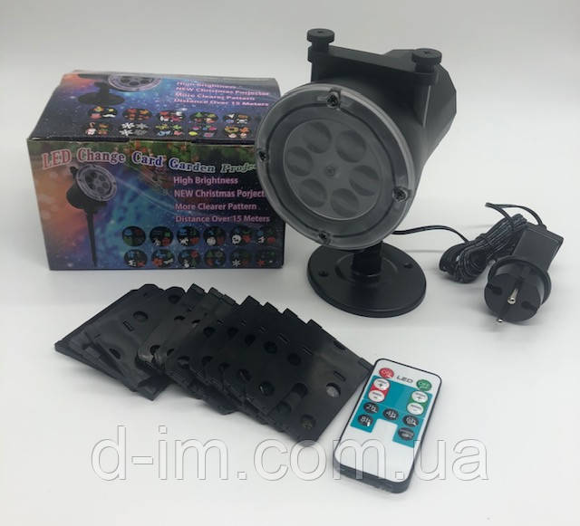 Лазерний проектор Новорічний WL-518 12 Picture Light With Remote / ART-0320 (Новорічний світ) (24шт)