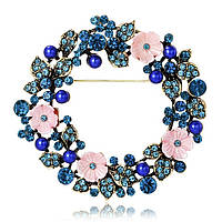 Брошка на золотистій основі квіточки із синіми стразами, що переливаються, та намистинами розмір виробу 65х65 мм