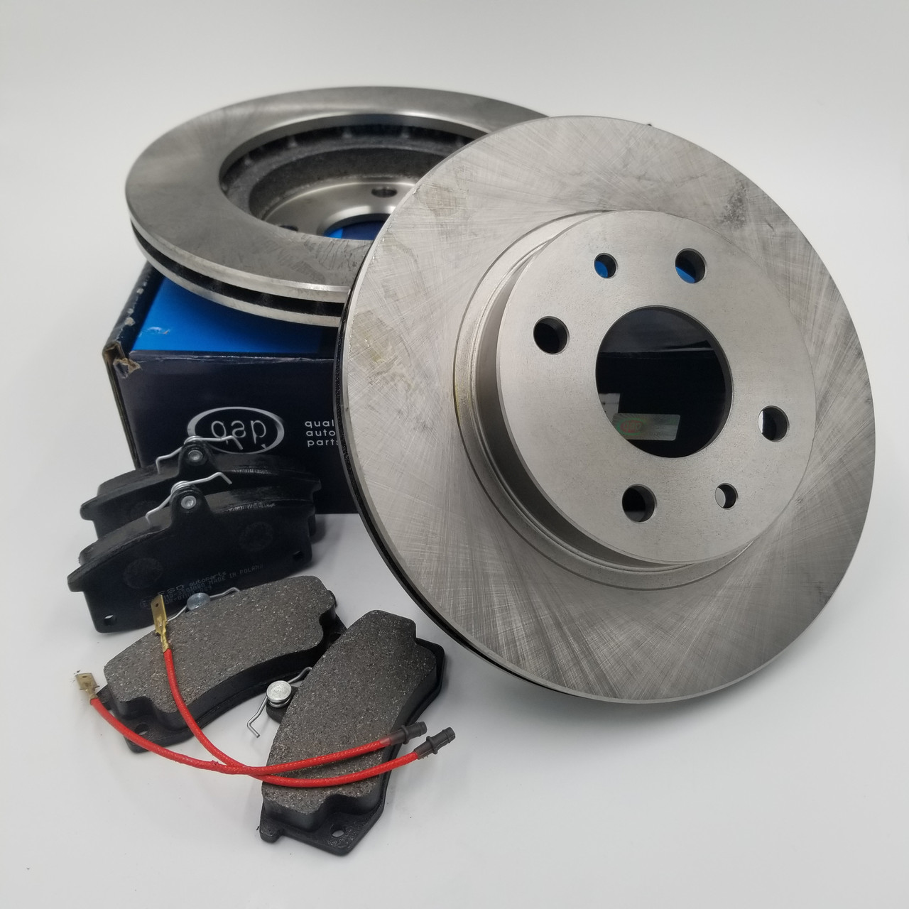 Диски гальмові ВАЗ 2110 R-13 (комплект 2-шт+колодки) QAP Польща