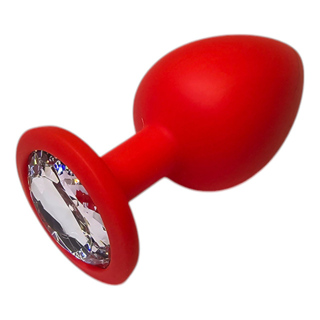 Анальна пробка силіконова червона з прозорим каменем середнього розміру
