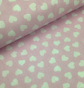 Бавовняна тканина польська серця білі на рожевому