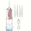 Іригатор для чищення зубів та порожнини рота Oral Irrigator з акумулятором та змінними насадками. Колір: рожевий, фото 4
