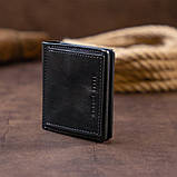 Вертикальне глянсове портмоне з накладною монетницьою GRANDE PELLE 11329 Чорне, фото 8