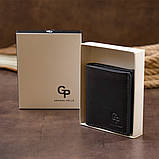 Вертикальне глянсове портмоне з накладною монетницьою GRANDE PELLE 11329 Чорне, фото 10