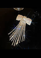 Заколка автомат Бант зі стразами 7*15 см золотиста