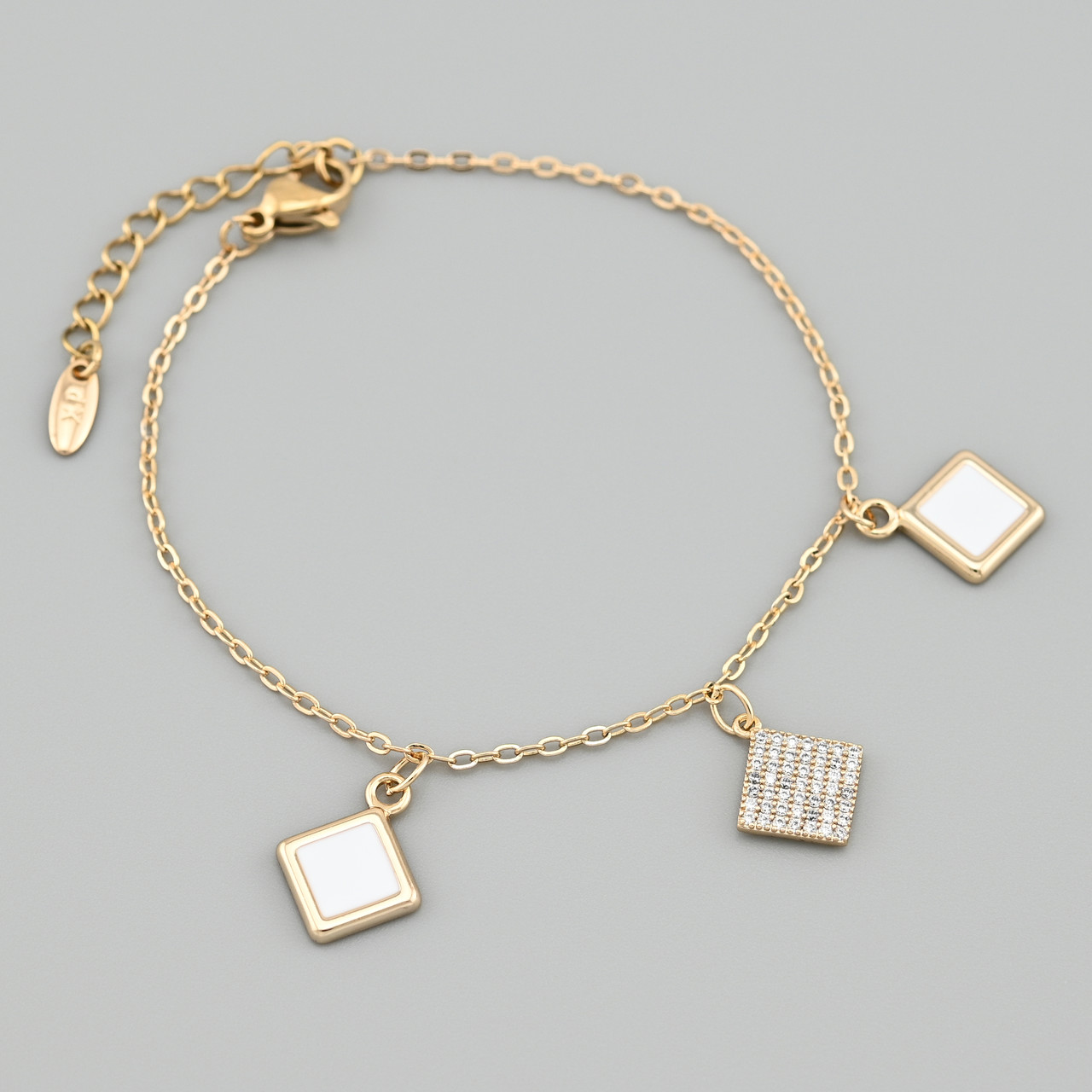 Браслет Ебі 48943 ширина 1.5 мм білі фіаніти біла емаль позолота 18К довжина 17+3, фото 1