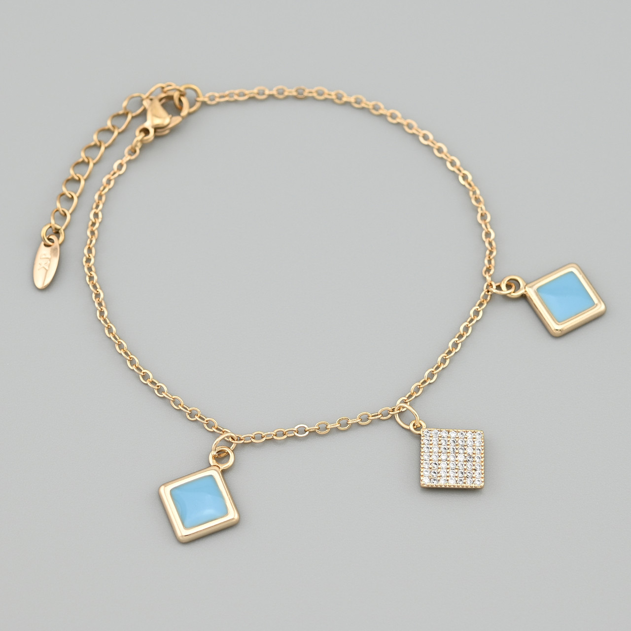 Браслет Ебі 48943 ширина 1.5 мм білі фіаніти блакитна емаль позолота 18К довжина 16+3, фото 1