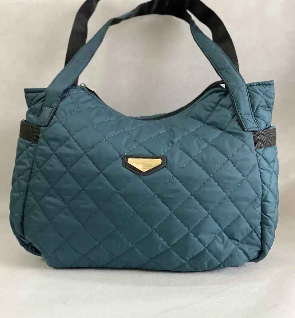 Стильна стьобана жіноча сумка дута плащівка з кишенями зелена