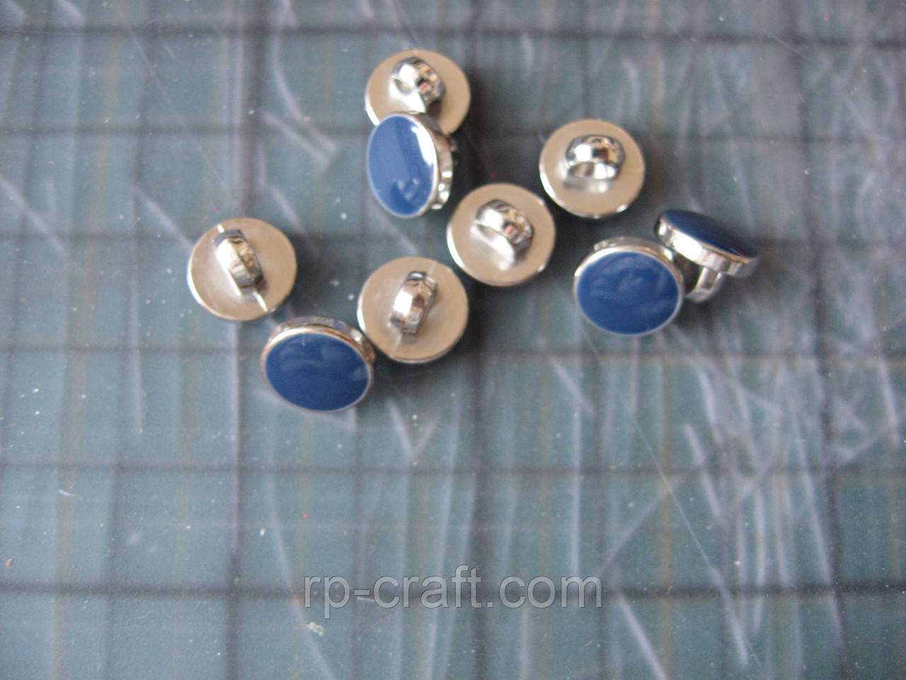 225. Набір пластикових гудзиків, 9 штук, 7х9х9 мм, сині та сталеві, фото 1