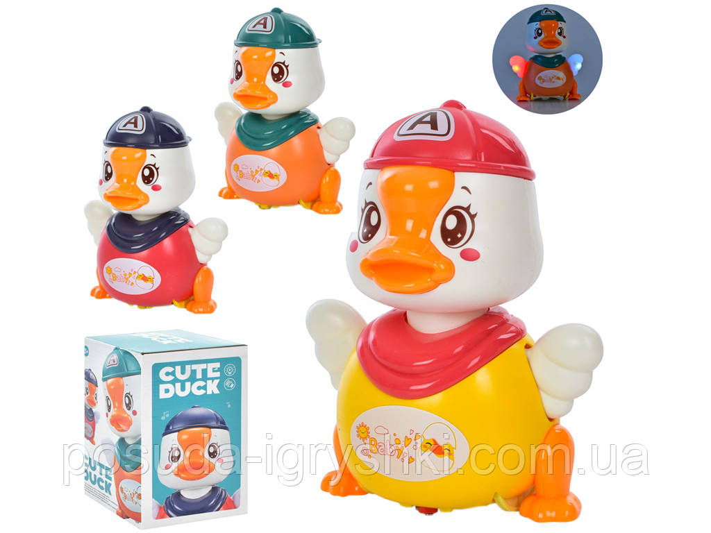 Музична іграшка 986A качка 17см, звук, світло, танцює, 3 кольори, на батарейці, в коробці, 11-17-11см, фото 1