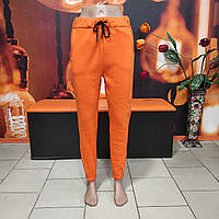 Штани жіночі спортивні трикотаж на флісі кишені шнурок 42 жовтогарячі