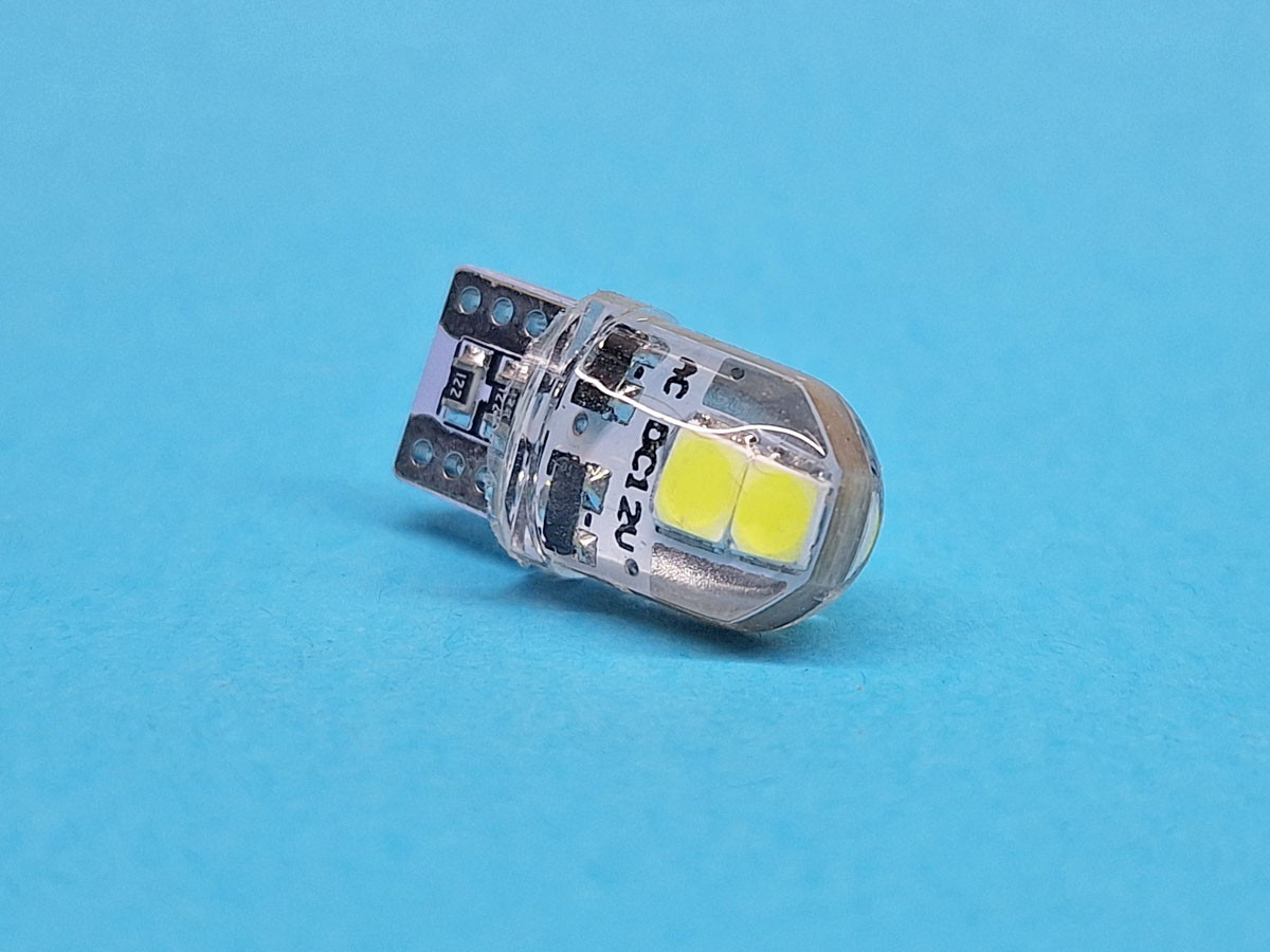 Світлодіодна лампа T10 W2,1x9,5d 12V 4 SMD 3030 WHITE з обманкою в силіконі, неполярна, друкована плата