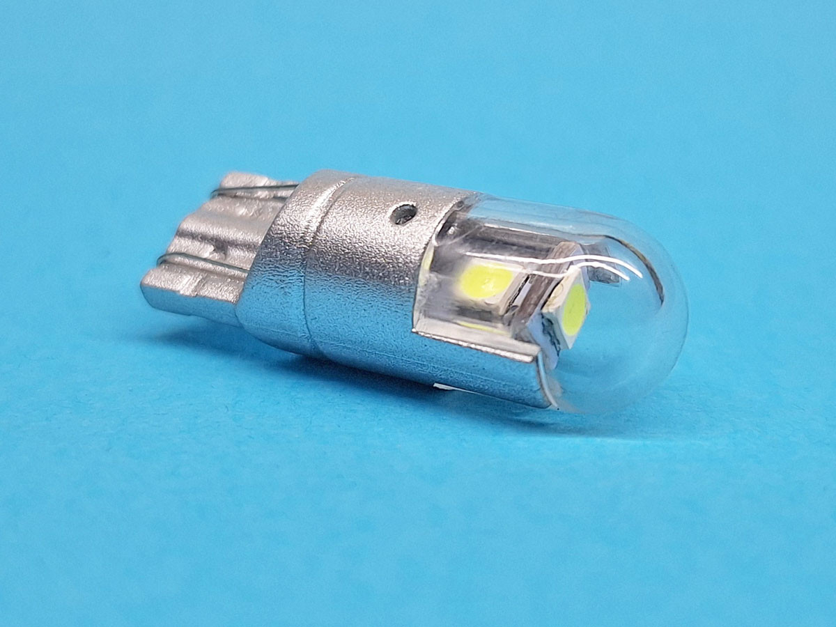 Світлодіодна лампа T10 W2,1x9,5d 12V 3 SMD 2835 WHITE матова лінза, сірий пластиковий цоколь