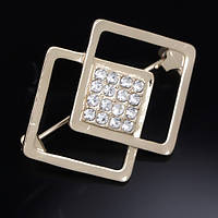 Брошка-бавка металева на золотистій основі з білими стразами розмір виробу 35х25 мм