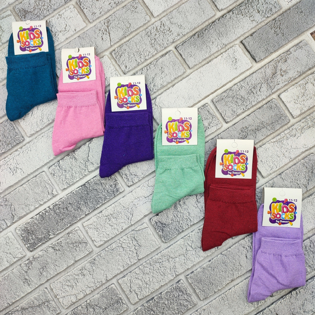 Шкарпетки дитячі середні весна/осінь р.11-12 однотонне асорті Kids Socks by Dukat 30039312