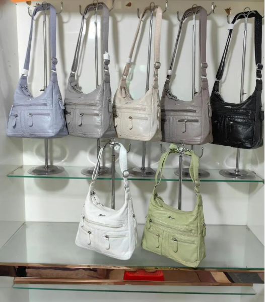 Сумка жіноча варенка на блискавці з кишенями та довгим ремінцем в різних варіантах Zhenya, фото 1