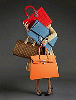 Жіночі вироби зі шкіри та текстилю