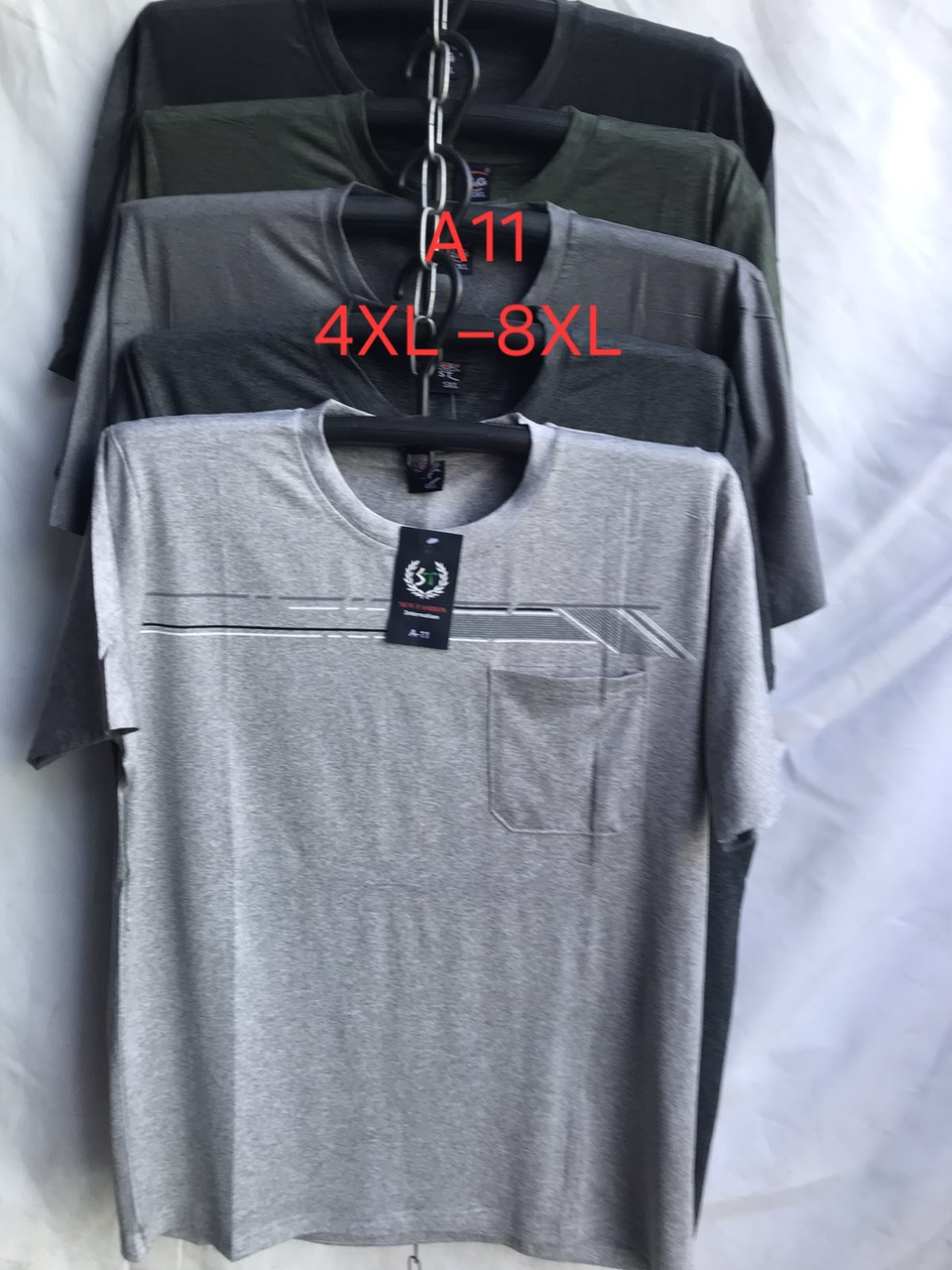 Чоловіча футболка трикотаж мікс кольорів розмір 4xl -8xl у пачці від 10 шт.
