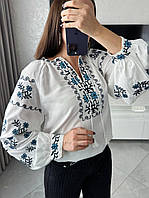 Нарядна жіноча блузка вишиванка прикрашена вишивкою гладью з пишними рукавами та китицями Туреччина