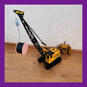 Радіокерований будівельний гусеничний кран 9503 підіймає/опускає вантаж