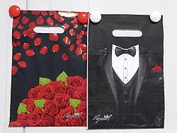 Поліетиленовий пакет із прорізною ручкою 200*300 мм Мікс 100 шт.