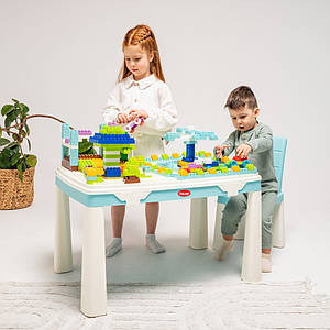 Дитячий стіл і стілець із накладкою для гри + 2 набори конструкторів. Doloni 04660/7