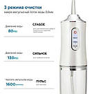 Іригатор для чищення зубів та порожнини рота Oral Irrigator з акумулятором та змінними насадками. Колір: білий JR-16, фото 9