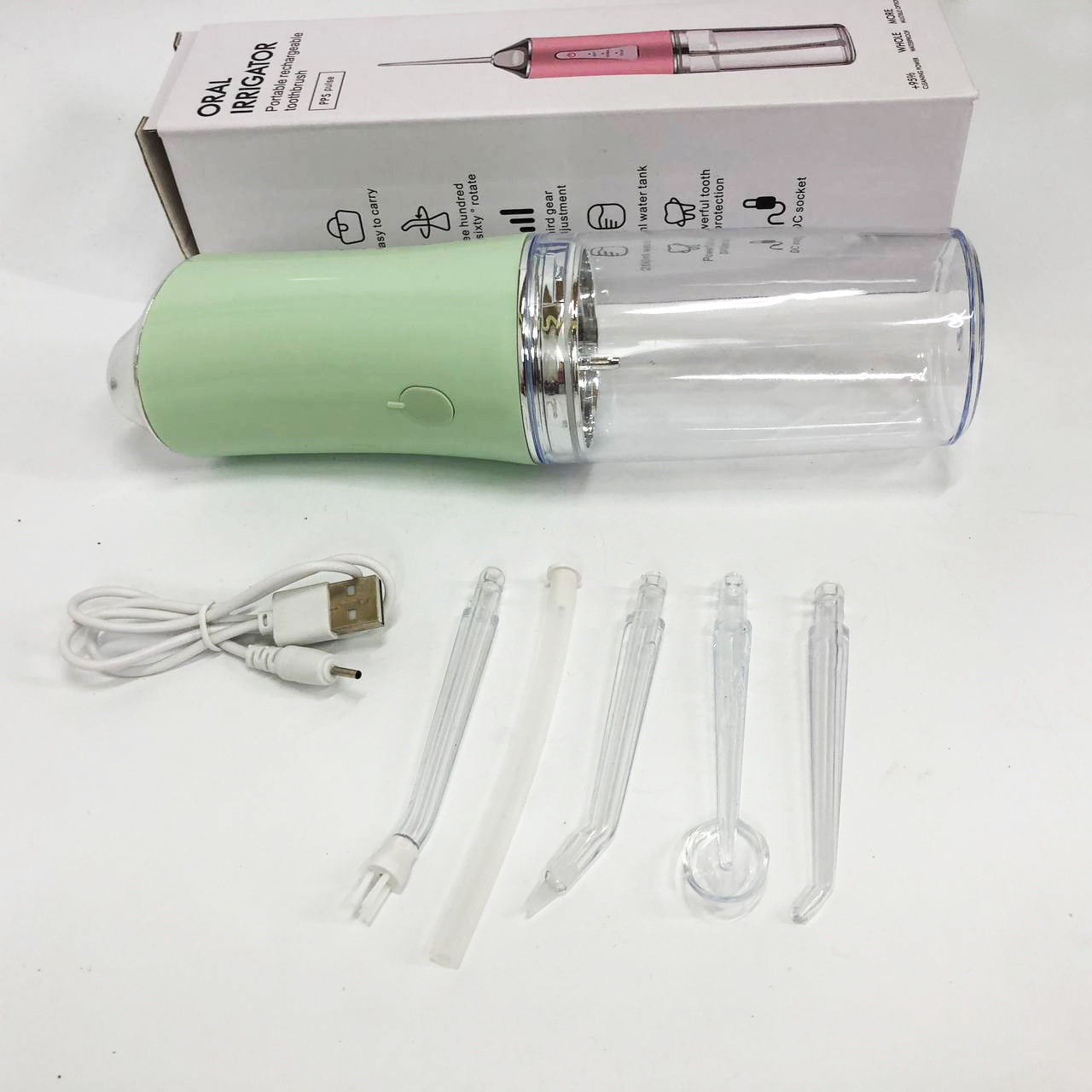 Іригатор для чищення зубів та порожнини рота Oral Irrigator з акумулятором та змінними насадками. Колір: зелений HE-82, фото 1