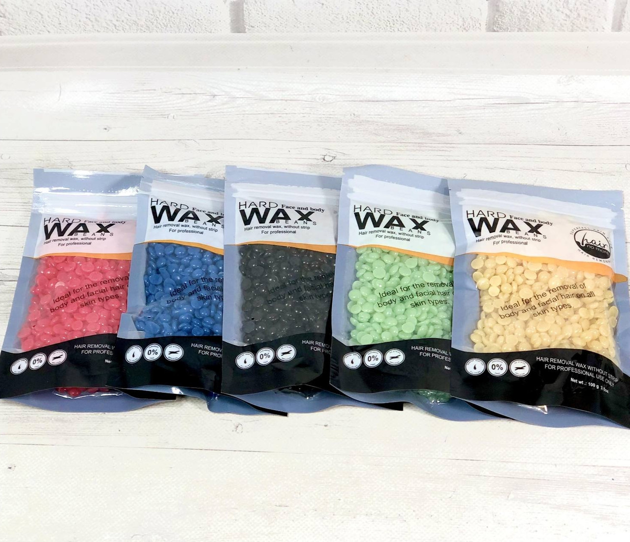 Віск плівковий для депіляції Depilatory Hard Wax Beans гранули face and body