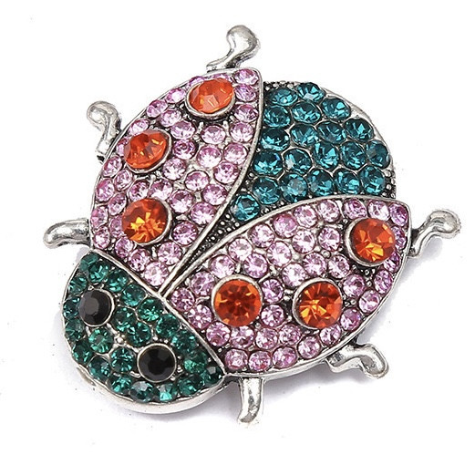 Брошка Коробка сріблястого кольору інкрустована різнобарвними стразами розмір виробу 3,5 х 3,5 см