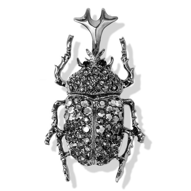 Брошка велика металева золотиста Жук Носоріг із сірими стразами розмір виробу 60х30 мм