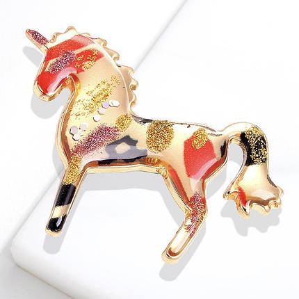 Брошка металева золотиста Єдиноріг покрита різнобарвними візерунками розмір виробу  45х35 мм, фото 1