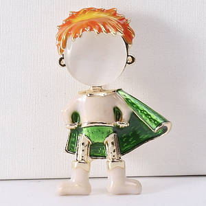 Брошка металева на золотистій основі хлопчик супер герой покрита кольоровою емаллю розмір 45х25 мм