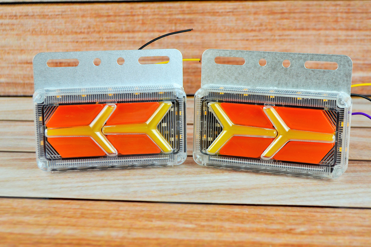 Габаритний LED ліхтар з рухомим поворотом та підсвіткою 24V жовтий (1 шт.) доза 2 шт NEW
