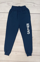 Дитячі спортивні штани розмір 7-10 років, колір показаний на зображенні у пачці від 4 шт.