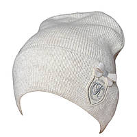 Красива тепла в'язана молодіжна шапка від Kamea KELI.