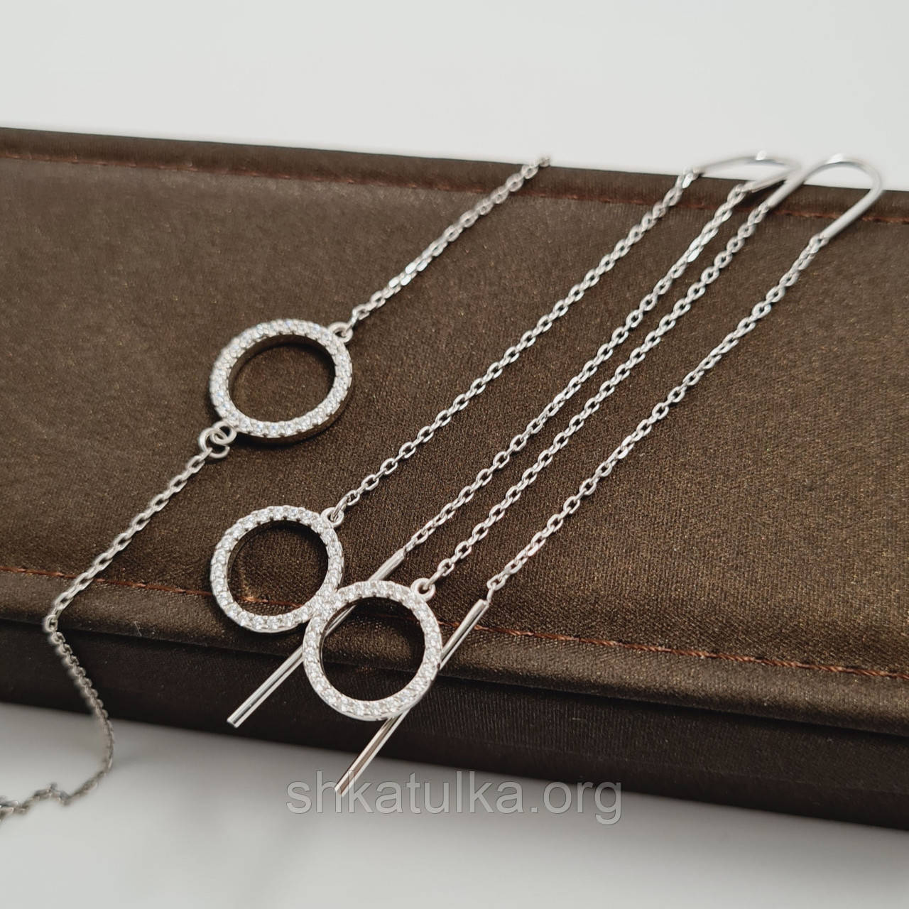 Комплект прикрас зі срібла браслет та сережки з білими фіанітами