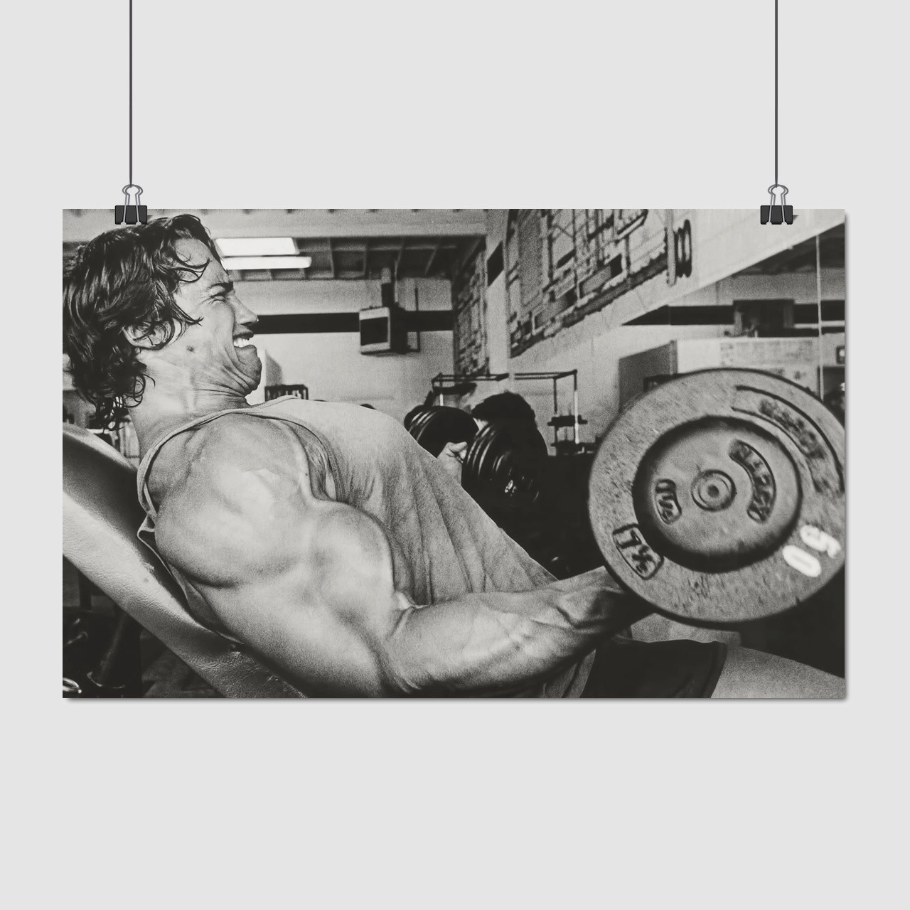 Плакат "Арнольд Шварценеггер, тренування з гантелей, 1975р, Arnold Schwarzenegger", 38×60см