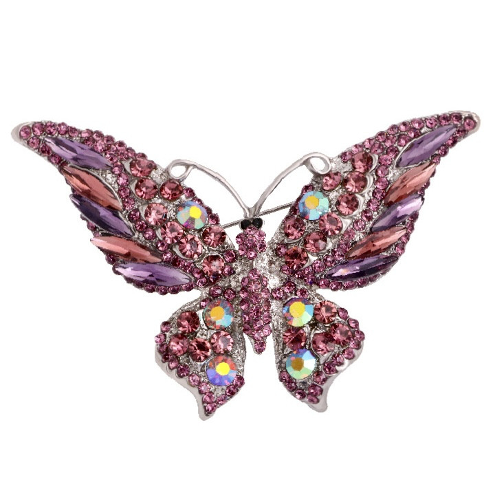 Брошка на сріблястій основі великий метелик із рожевими стразами, що переливаються, розмір 60х85 мм