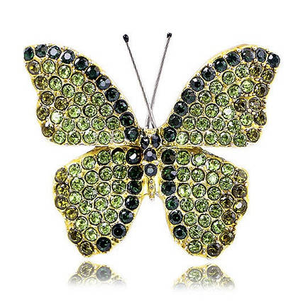 Брошка на сріблястій основі метелик із зеленими кришталевими стразами розмір 35х30 мм, фото 1
