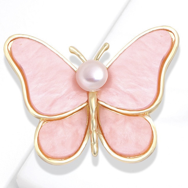 Брошка на золотистій основі метелик із рожевими мерехтливими крильцями та намистиною розмір 40х35 мм