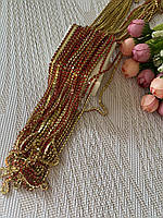 Стразова цепочка Червоний камінь 2мм в золотій оправі (1 метр),