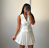 Женский весенний костюм жилет на пуговицах и юбка-тениска в складки на молнии размеры 42-48