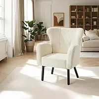 Зручне крісло з букле в скандинавському стилі