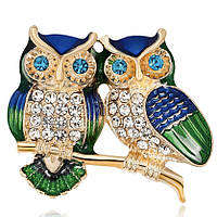 Брошка металева на золотистій основі дві сови на гілочці зі стразами покрита кольоровою емаллю розмір 30х25 мм