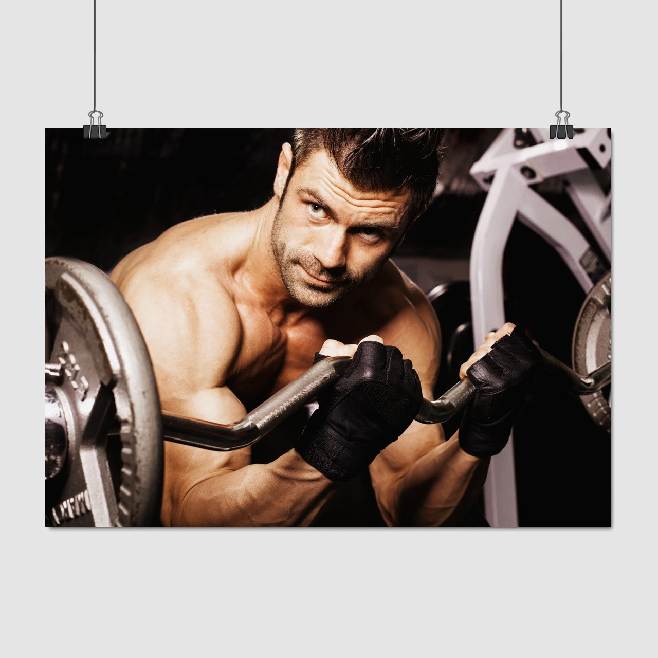 Плакат "Бодібілдер зі штангою", 43×60см
