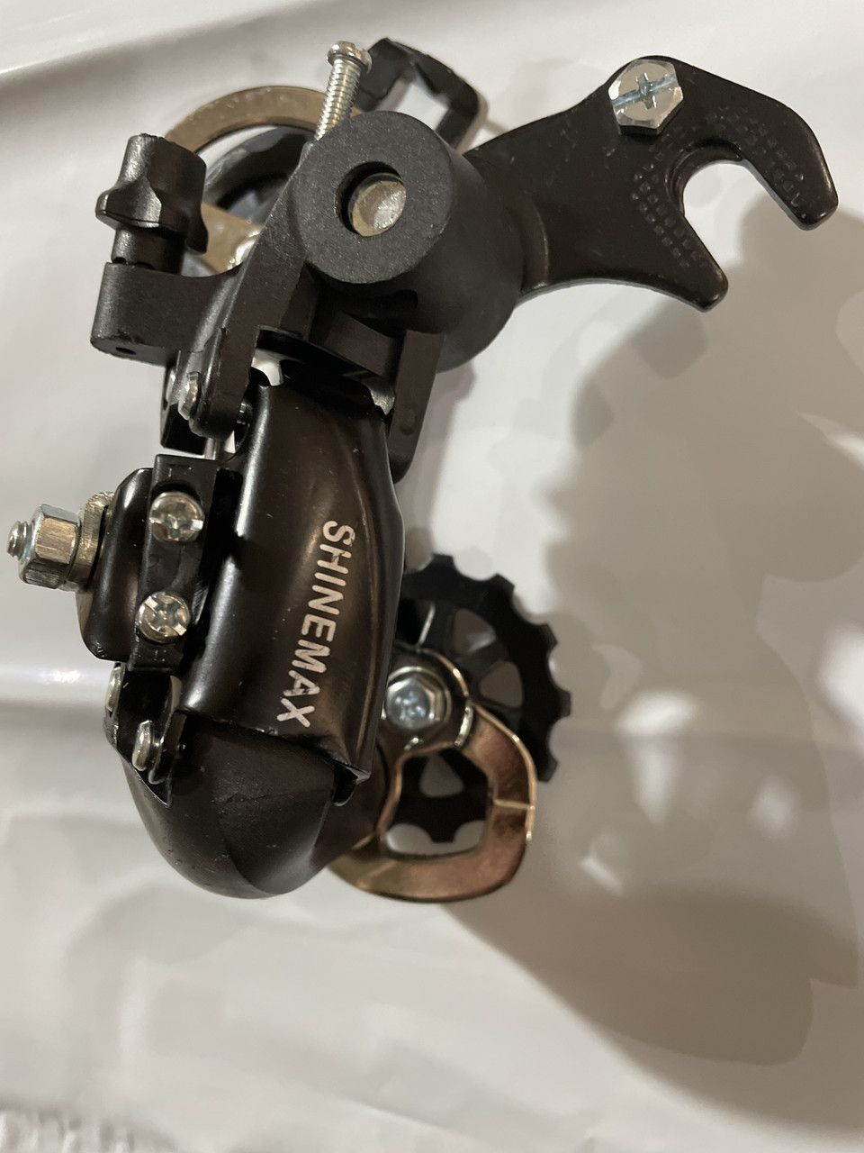 Перемикач швидкостей велосипеда задній (кріплення на вісь) (TX35) (SHMN) YKX