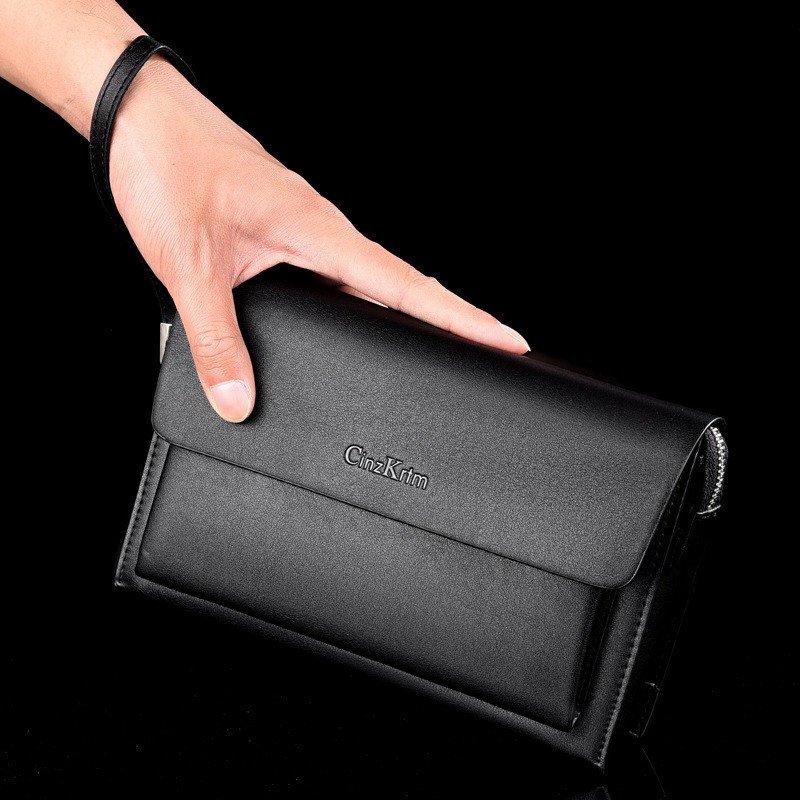 Чоловічий гаманець. Чоловічий клатч. Гаманець чоловічий місткий портмоне Чорний, фото 1